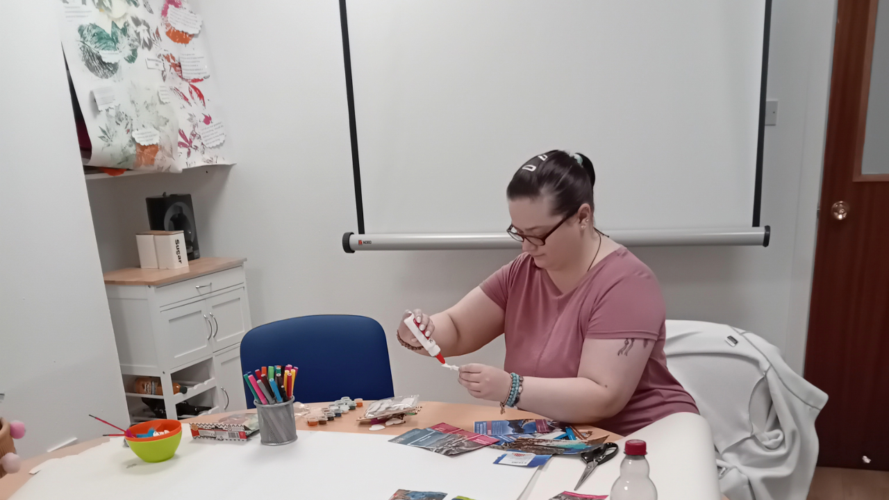 Nikita during her last 1 to 1 support session with Hearing Voices in Perth working on her dream board