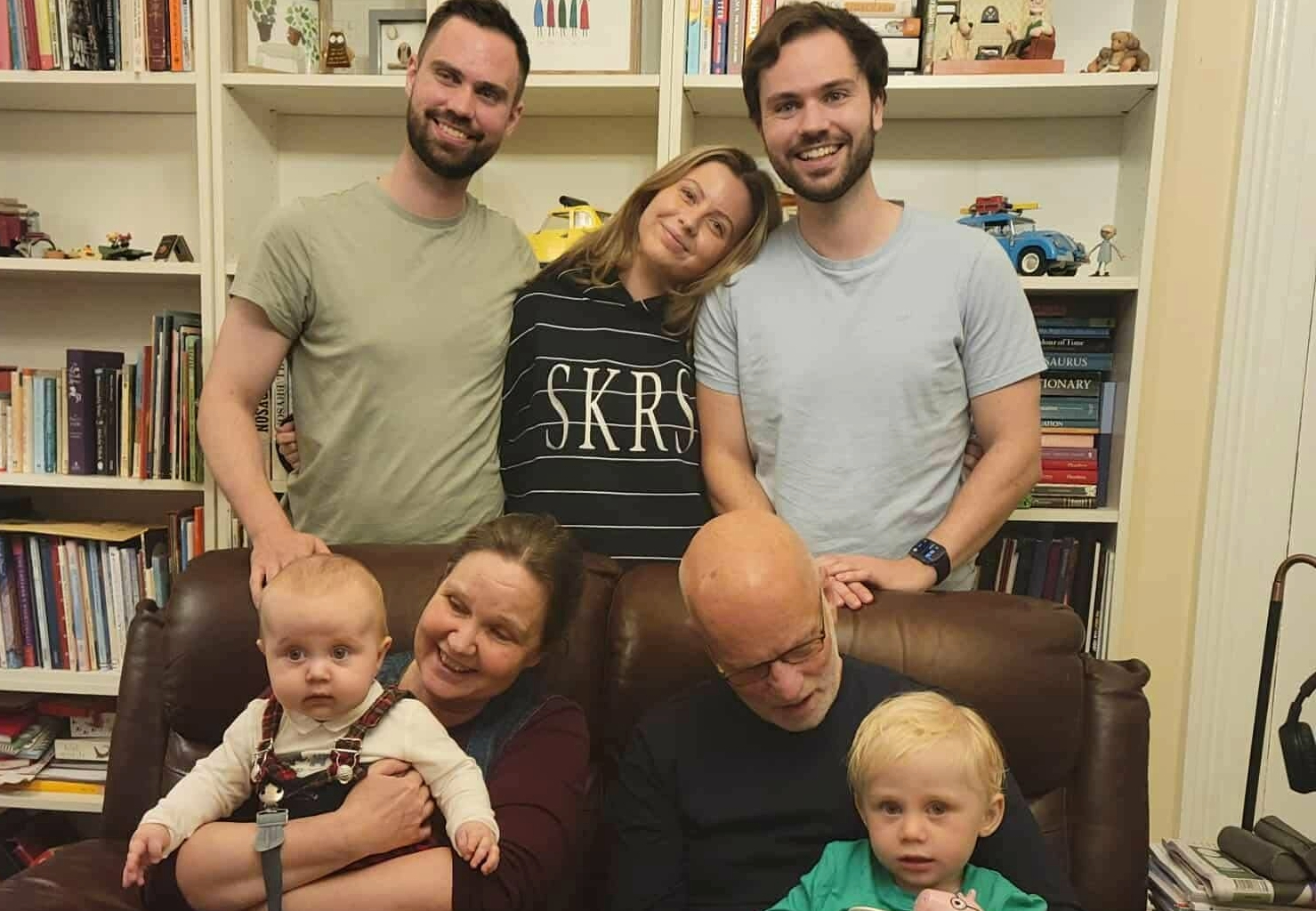 Emma with her children and grandchildren and her husband John - her story about materhood, postnatal depression and being a grandmother