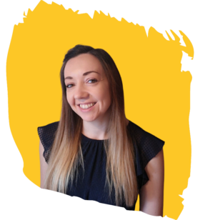 Smiling woman with long brown hair wearing a black top, set against a bright yellow abstract background.